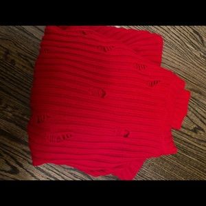 Red ribbed sweater with cuts
